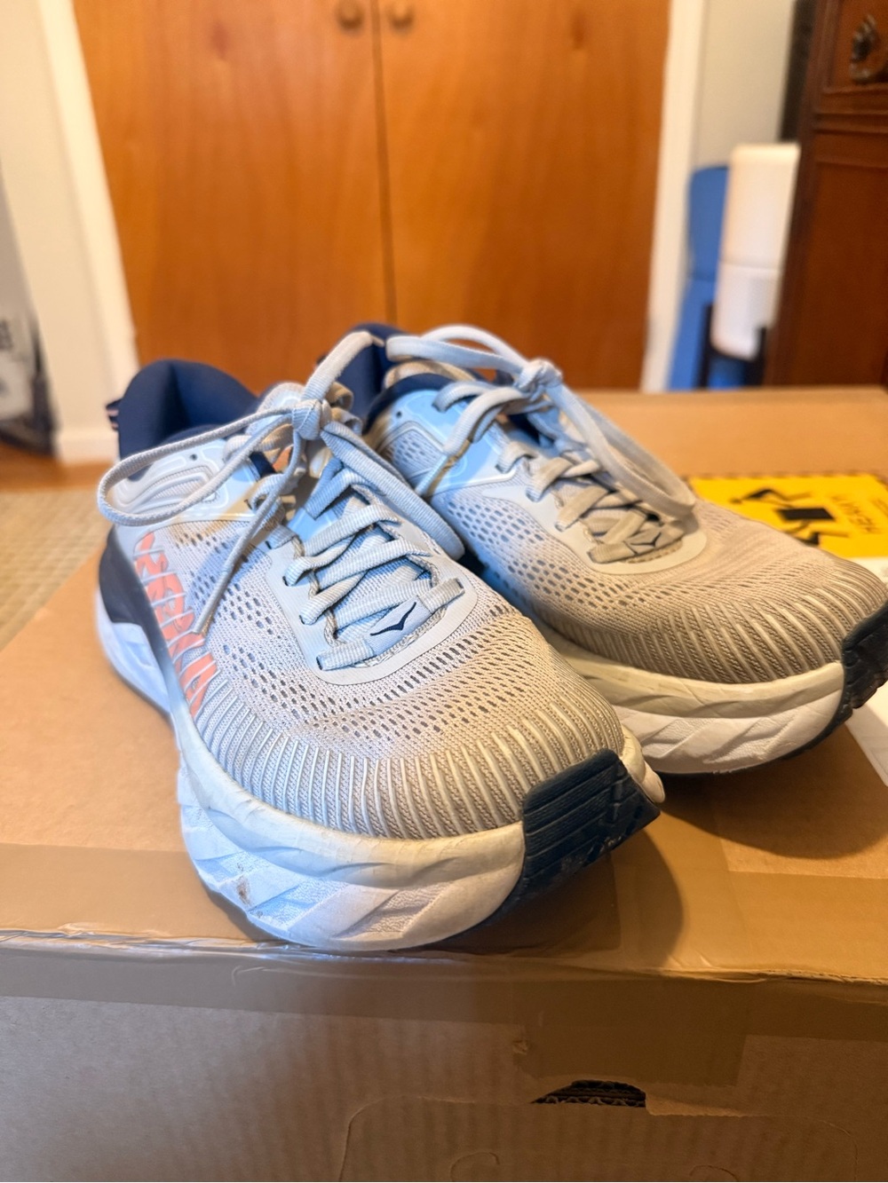 Hoka Gray and Navy Women's Running Shoe Pair